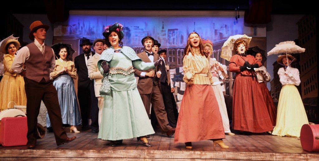 Cast members of Hello, Dolly sing and dance across Limelight's stage this summer.