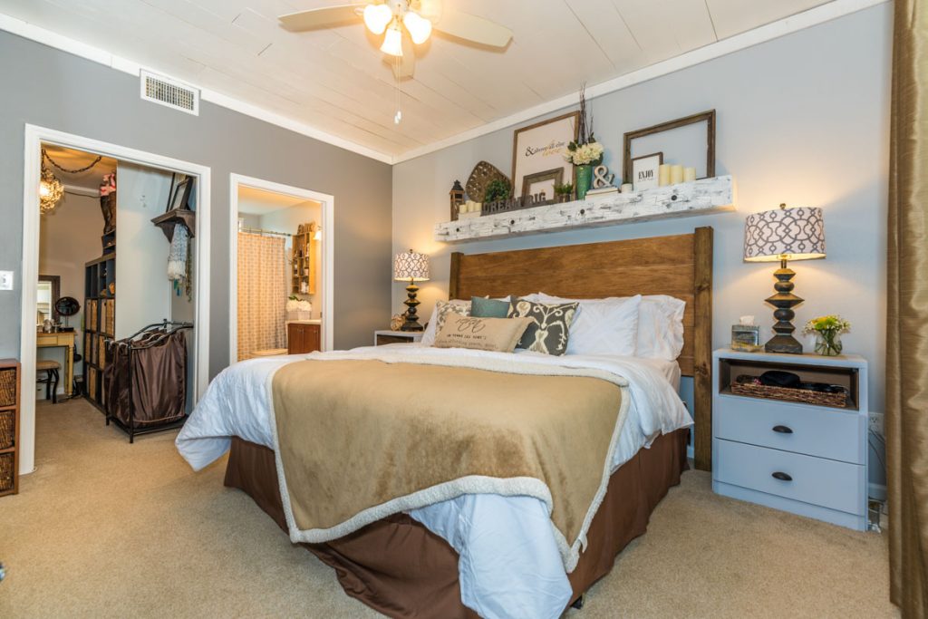 blue beige and grey bedroom decor with farmhouse chic feel in las palmas condo st augustine