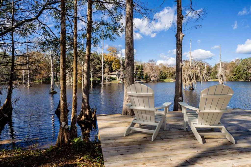 longleaf house's backyard on the shores of beluthahatchee lake