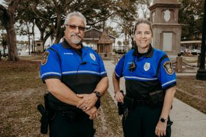 officers carol druin and steve fischer stand in the plaza in downtown st augustine