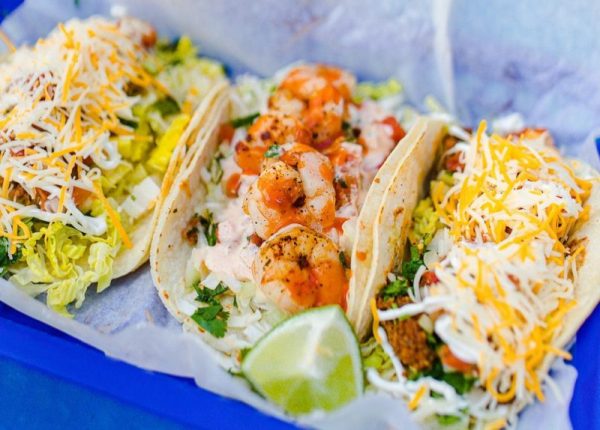 Three Tacos sit on a plate at Burrito Works Taco Shop in St. Augustine