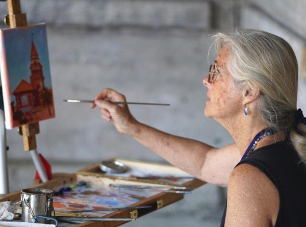 Artist Teri Tompkins paints during the 2019 Plein Air Paint Out